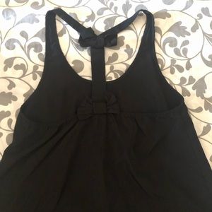 black “Love Culture” brand T-back tank top